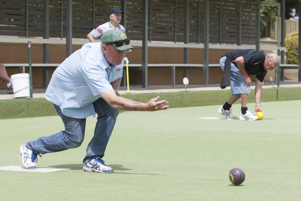 ON THE RINK: Mick Dowd tries his luck and sends a forehand down the rink at Ararat Bowls Club. Picture: PETER PICKERING