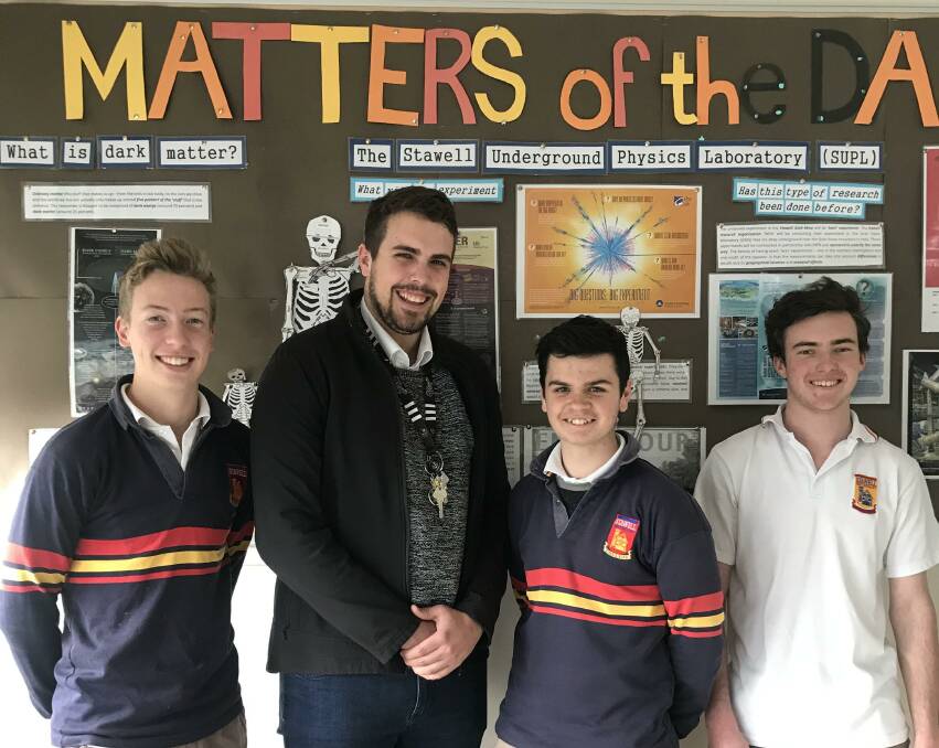 Stawell Secondary College students Lachlan Dalkin, Max Waters and Patrick Wemyss with physics teacher Nicholas Oliver. Picture: CASSANDRA LANGLEY