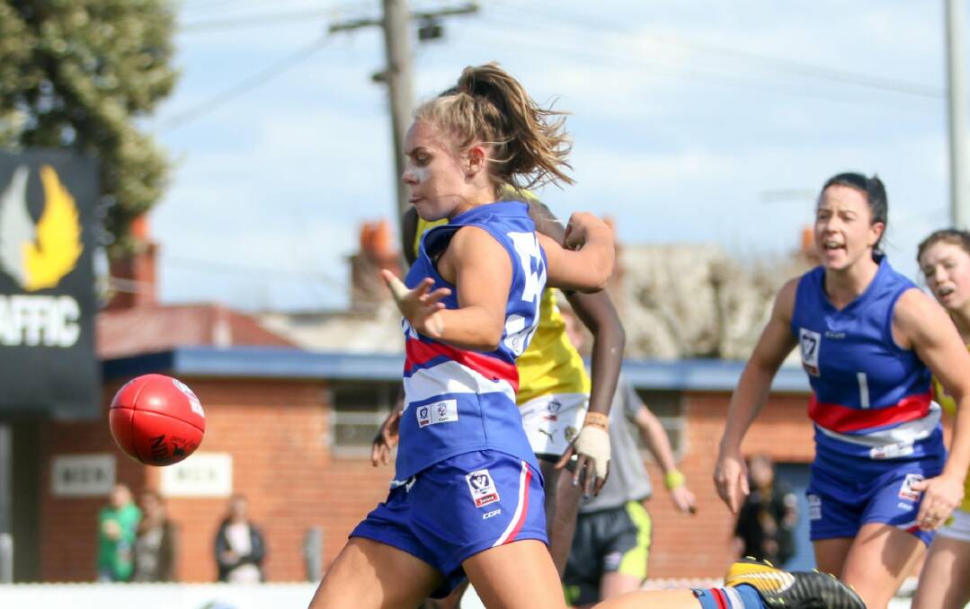 KICK: Ella Wood roosts the ball forward while playing for the Bulldogs earlier in the season. Picture: ELEANOR JEANNE PHOTOGRAPHY