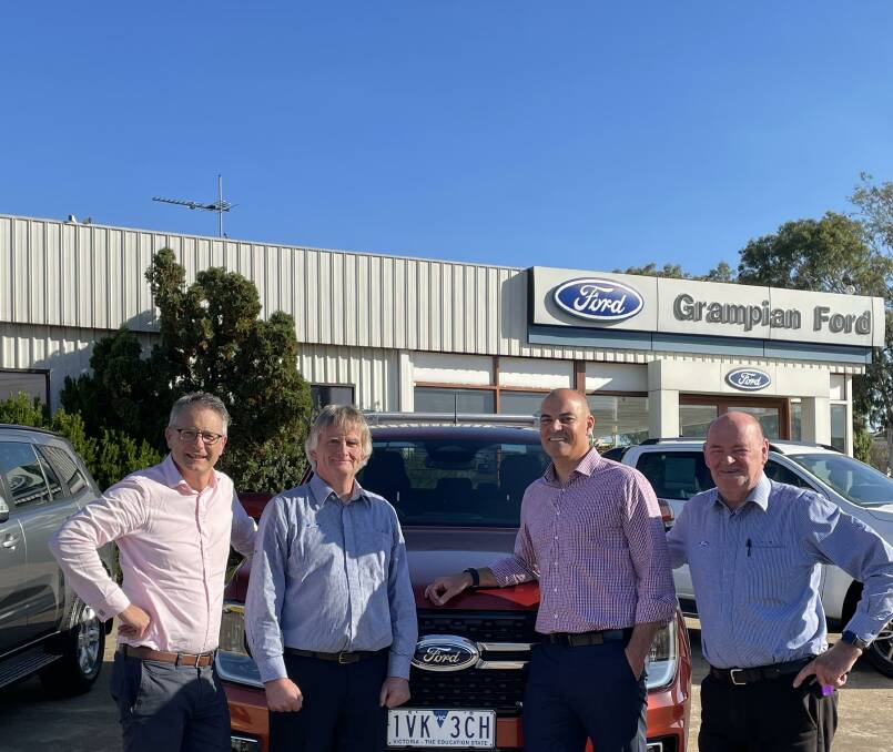 CHANGING HANDS: Ford Australia's chief executive Andrew Birkic with Grampian Ford outgoing dealer principals Gary Hargreaves and Geoff Faneco (far right) welcome new principal Anthony Kevric to the region. Picture: NICK SMITH