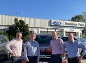 CHANGING HANDS: Ford Australia's chief executive Andrew Birkic with Grampian Ford outgoing dealer principals Gary Hargreaves and Geoff Faneco (far right) welcome new principal Anthony Kevric to the region. Picture: NICK SMITH
