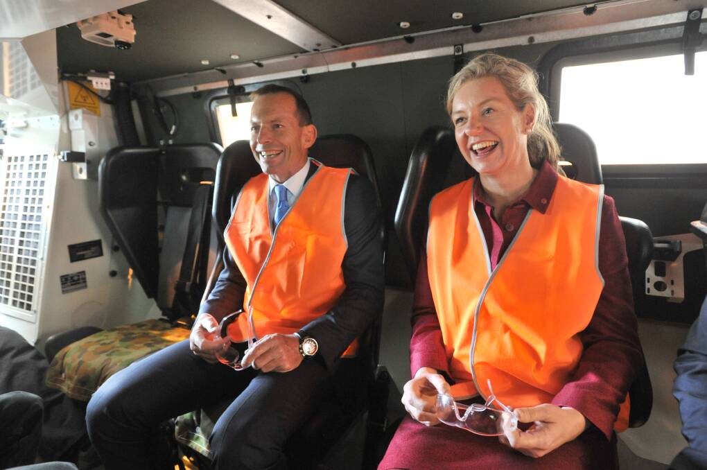 Then opposition leader Tony Abbott visits Thales in 2012. He is pictured in a bushmaster with senator Bridget McKenzie. Picture: PETER WEAVING