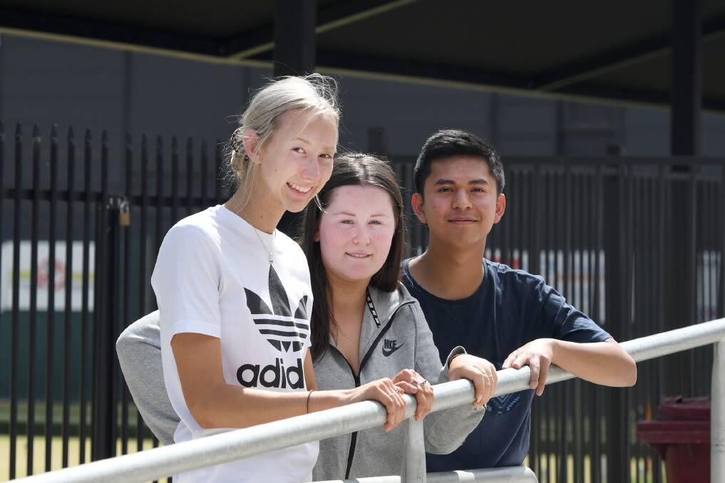  WAIT IS OVER: St Brigid's College's Tashana Meyer, Emmalee Anton, and Gerard Natividad are among the students who will receive their results today. Picture: SAMANTHA CAMARRI
