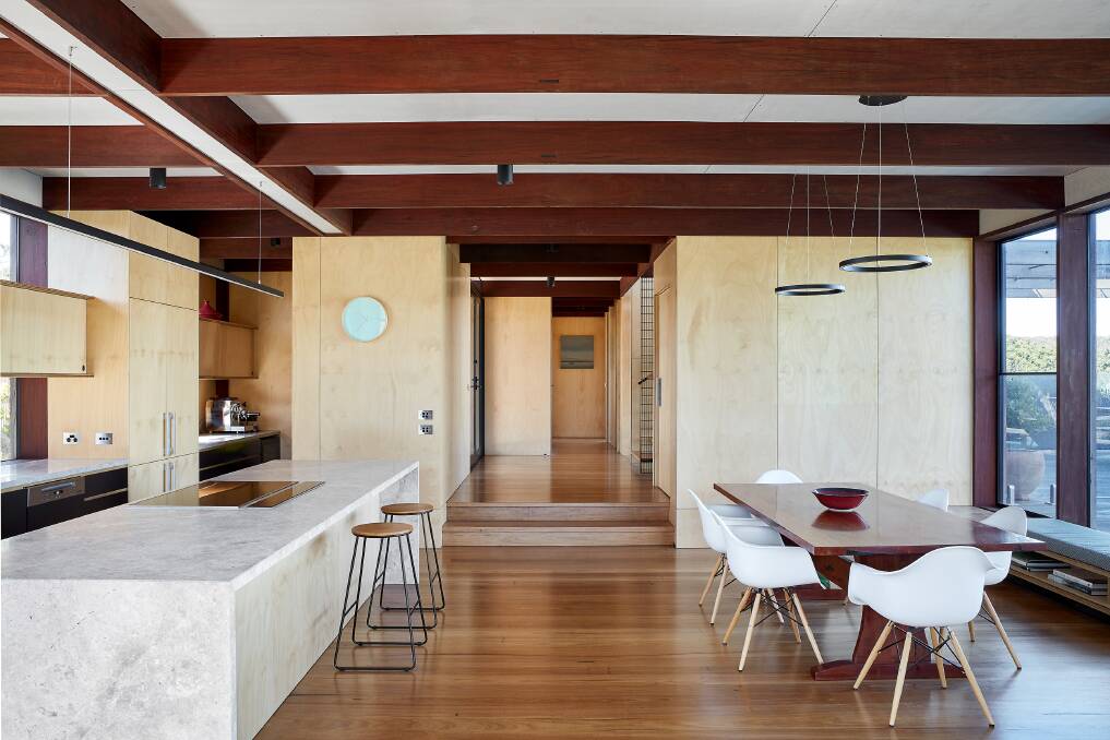 GLOWING: The plywood lining of the walls and sealed fibre cement ceiling provides a warm palette.