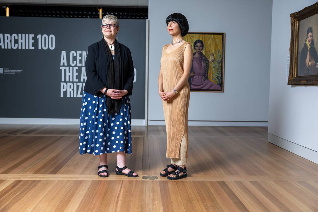 Curator Natalie Wilson with artist Yvette Coppersmith and her work Self-portrait, after George Lambert at Archie 100. Picture by Gary Ramage