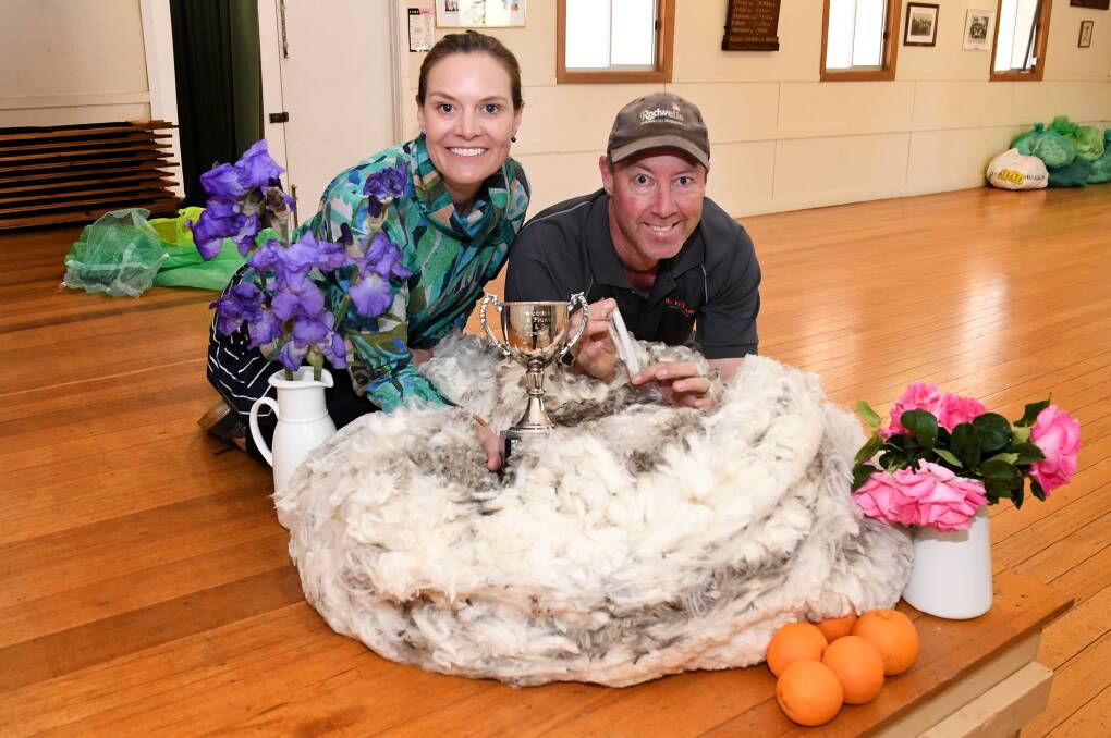 SHOW PREPARATIONS: Wonwondah Hall committee member Rebecca Heard and president Andrew Bell get ready for the Wonwondah Hall Fleece and Flower show this Sunday. Picture: SAMANTHA CAMARRI