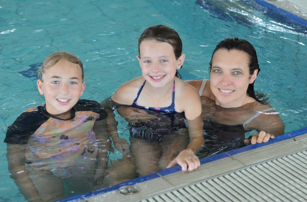 HOT DAYS AHEAD: Adele Joseph, Ella Johns and Lynne McKenzie cooled down at the Horsham Aquatic Centre earlier this month. Picture: DAINA OLIVER