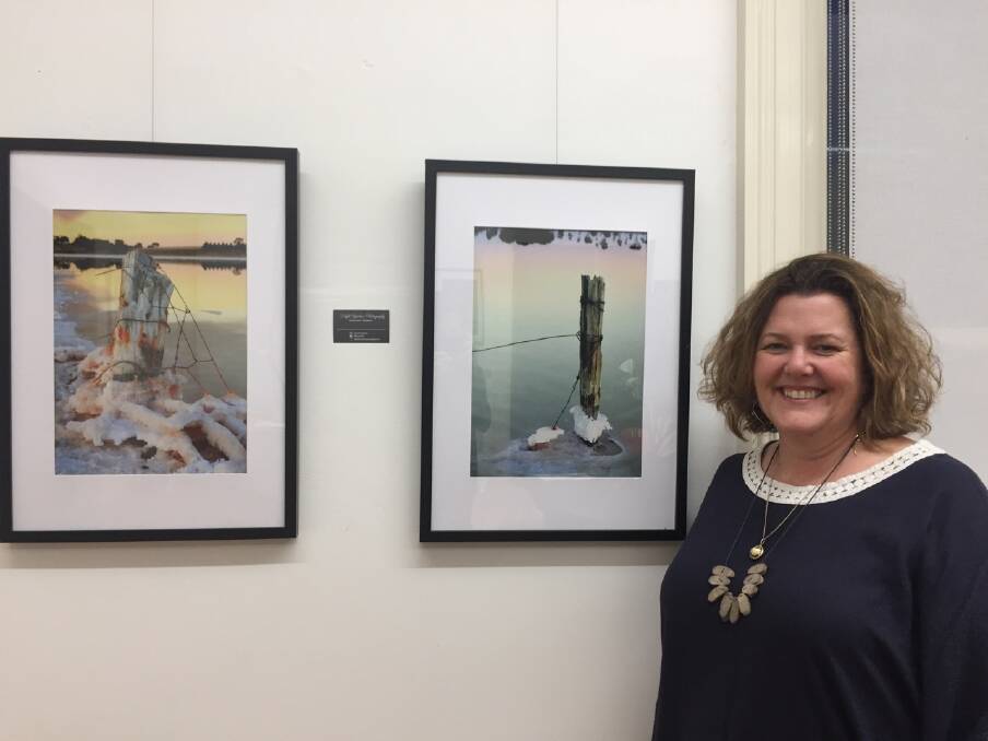 SNAPPED: Ainsley Cameron pictured with photos of the Willaura Salt lakes.