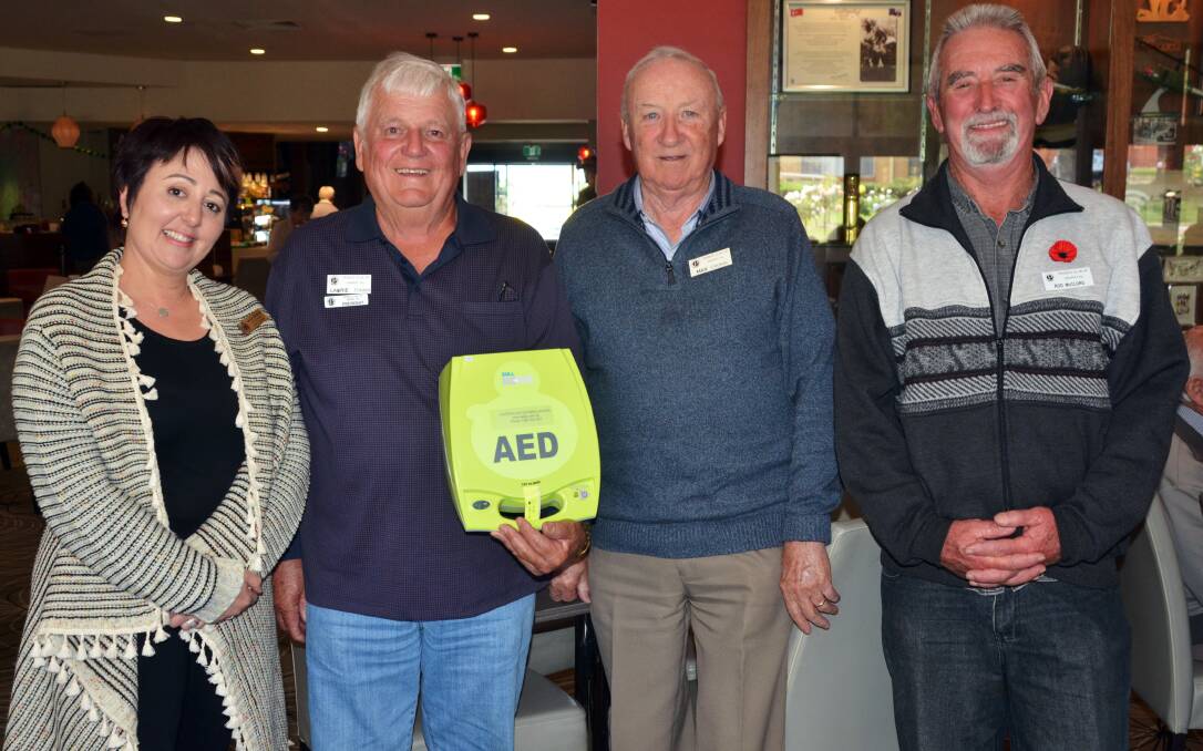 LIFE SAVING: Ararat RSL general manager Maria Whitford, Probus president Lawrie Tonkin, committee member Max Cronin and secretary Rod McClurg with the new defibrillator.