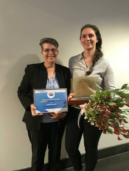 WINNER: Dental coordinator Kaylene Jackson with Lauren Milloy, receiving her award for Champion of Oral Public Health. Picture: CONTRIBUTED. 