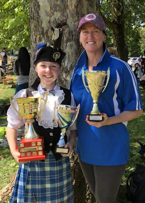 Abbey Rigby with dance teacher Melissa Perry after winning multiple trophies at the Daylesford Highland Gathering competition. 
