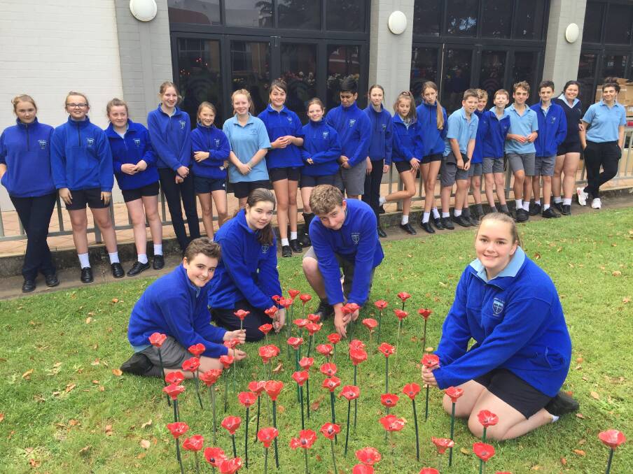 HONOURED: Students Beau Manly, Ruby O'Connell, Kade Scott and Emily Marsh helped their peers plant about 1400 poppies by the Ararat RSL.