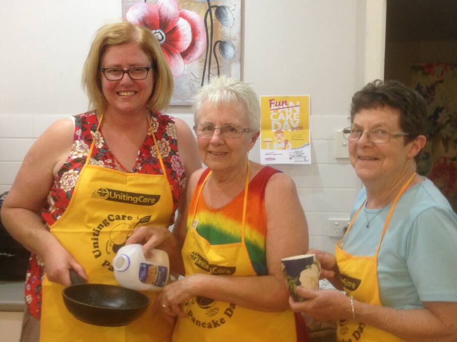DELICIOUS: Philippa Hale, Carole McGregor and Meryl Poole are getting ready to make dozens of pancakes for the community. 