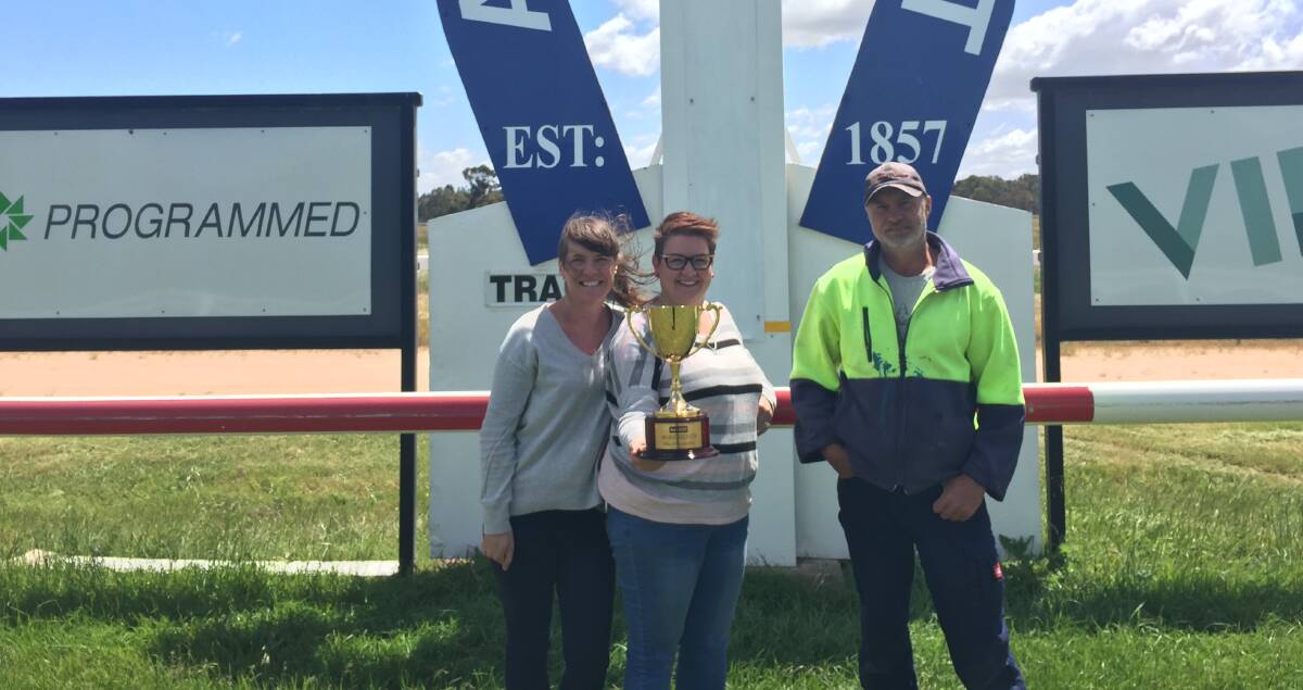 GOLDEN: Ararat Turf Club members Penny Penfold, Kate Kirkpatrick, and Peter Borinelli are preparing the track for Sunday's Bet365 Ararat Gold Cup. Picture: JESSIEANNE GARTLAN. 