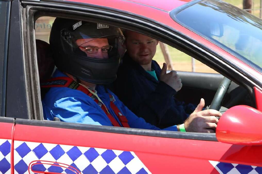 Mick Petrov behind the wheel, 
with crew member Justin Shuttleworth.  