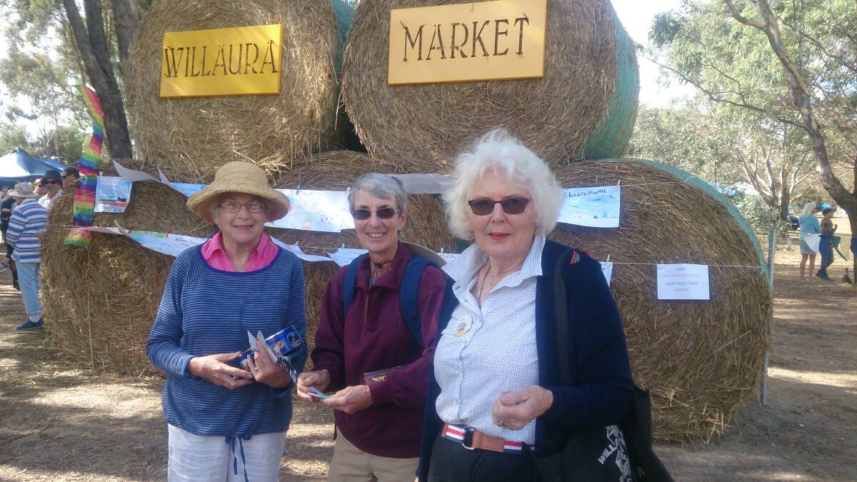 Willaura Healthcare Outdoor Market coordinator Jane Millear (right) chats to market patrons at last year’s market.