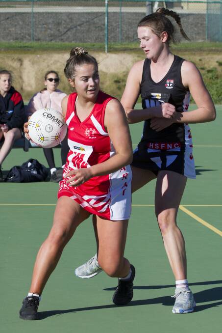 FAST: Ararat's Tayla Borrelli takes on a Saints player. Picture: PETER PICKERING.