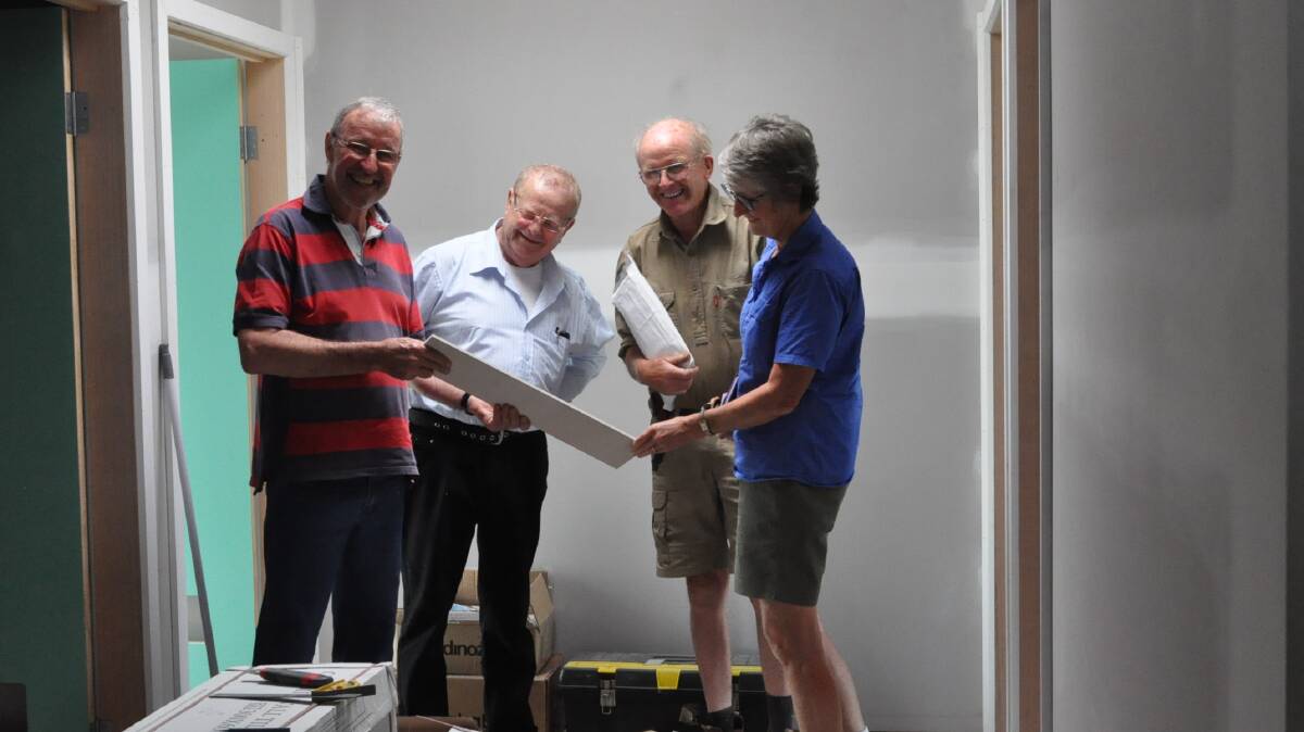 Willaura Hall Committee members Ron Jenkinson, left, Nico Vanderwerf, Tony Millear and Heather Fleming review the plans for the upgraded facility. Picture: ARARAT RURAL CITY COUNCIL.
