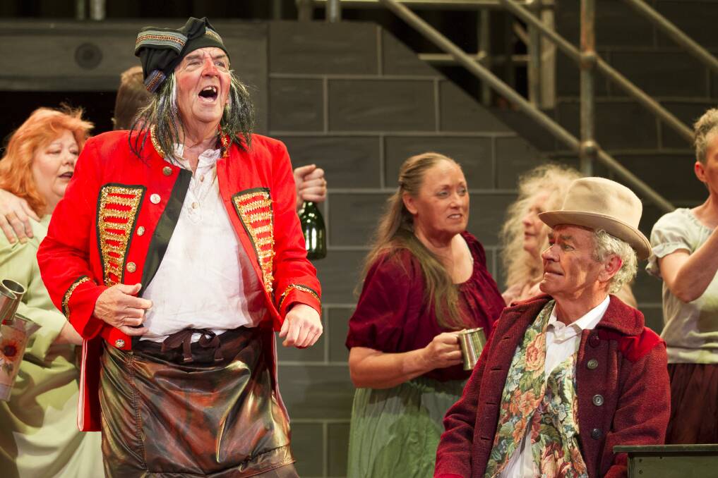 SING: Ian Wright as tavern owner Monsieur Thenardier and Frank Kitchen as a punter in Les Miserables. Photo: PETER PICKERING.