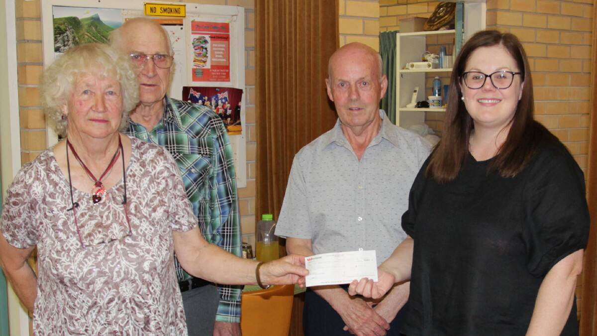 GENEROUS: Ararat Charity Dance members Jean and Keith McCready, left, Jim Murphy, presenting a cheque to East Grampians Health Service community liaison officer Jodie Holwell. 