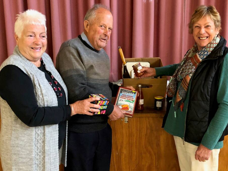 Leonie Foster, Howard Hutchison and Alwyn Kitchen with a mystery box.