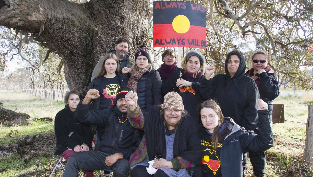Djabwurrung Elder, Aunty Sandra Onus, front second from right, with a group of protesters set up a blockade for the Western Highway duplication in June. Picture: PETER PICKERING