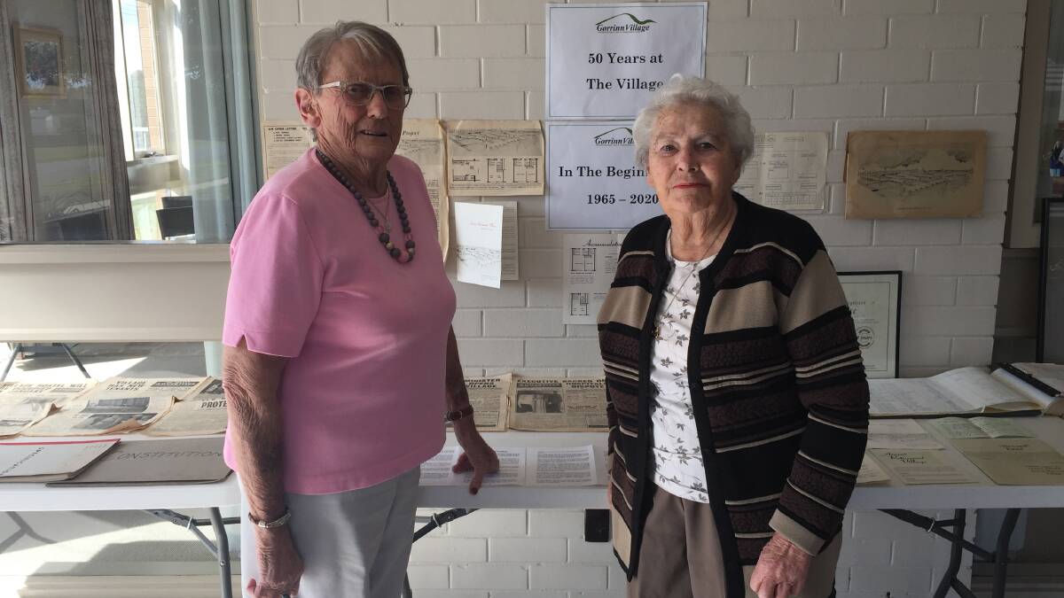 REMINISCING: Jan Darbyshire and Ruth Clark take in the display at the Ararat Retirement Village.