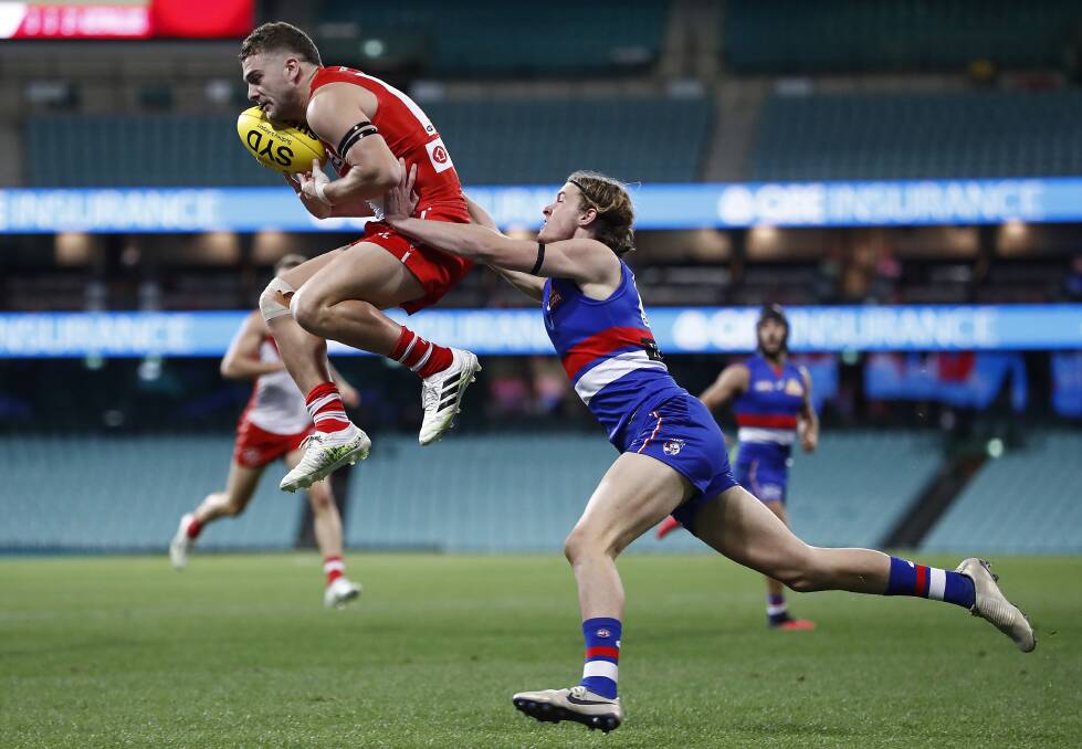 The Swans' Tom Papley marks during the Round 4 AFL match against the Western Bulldogs at the SCG last Thursday. Photo: Ryan Pierse/Getty Images