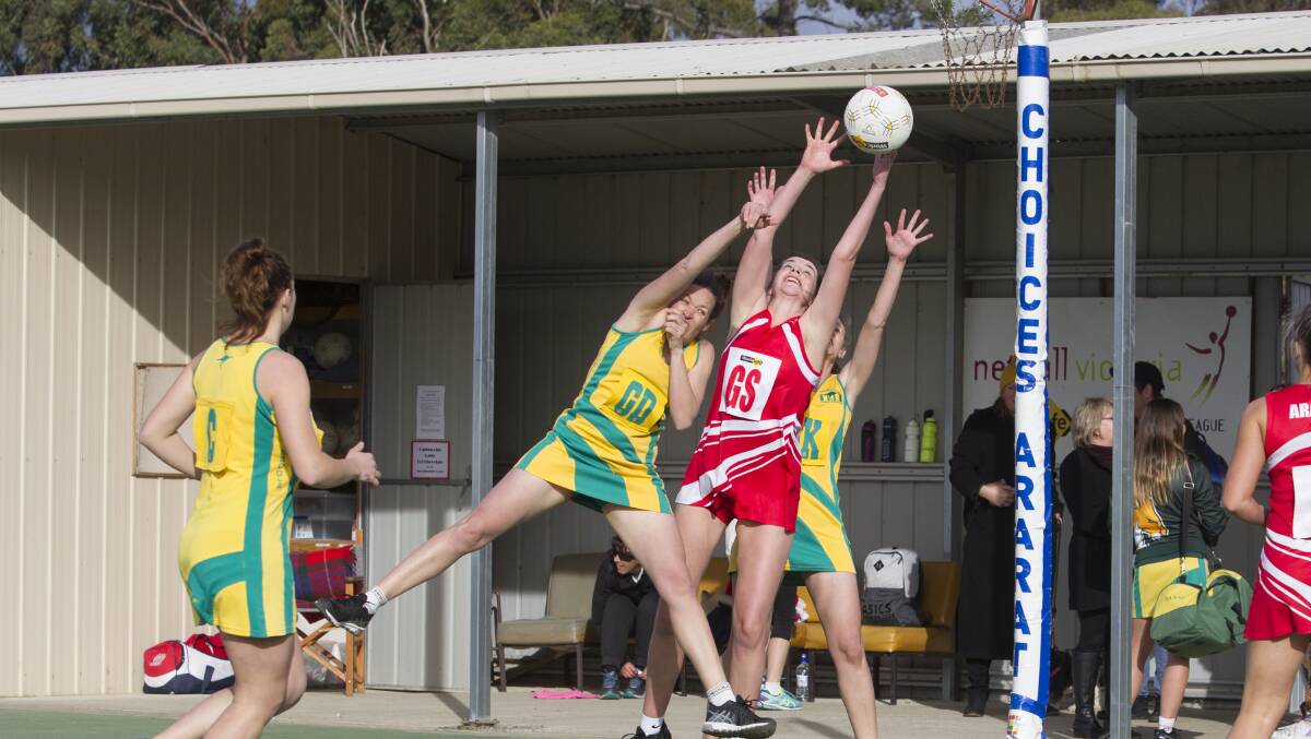 Cecilia Stewart of Ararat launches for the high ball. Dimboola proved too strong in their mid-table clash, holding off a gallant Ararat. Photo: Peter Pickering
