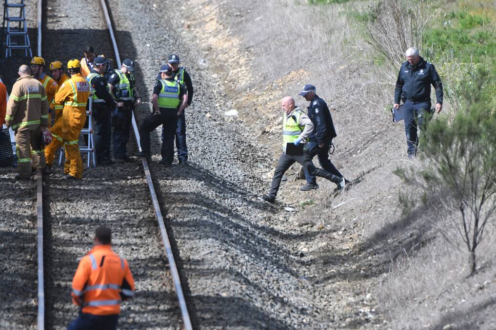 Police and emergency services at the site of the train fatality at Ballarat East. Picture: Kate Healy