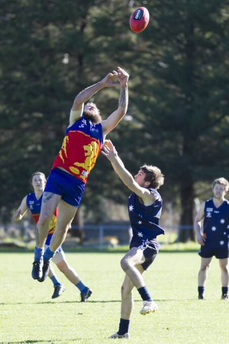 UP THERE: Great Western's Justin Thomas flies for a mark against the Ararat Eagles. The Lions' president has hosed down claims they sought to embarrass their opponents.