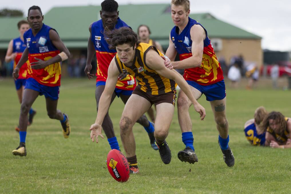 ON THE BALL: Tatyoon's Jack Antonio and the Great Western Lions are finals bound. The Hawks go in on the back of a big victory, while the Lions need to turn things around.