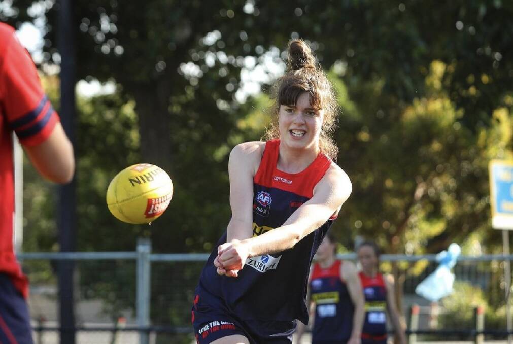 HARD YARDS: Isabella Simmons training with the Melbourne Demons. Picture: MELBOURNE FC