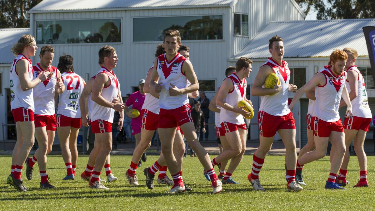 Ararat runs out to warm-up in 2019. Picture: PETER PICKERING