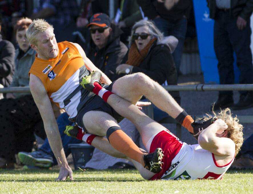 Southern Mallee Giants' ruckman Reece McNally accidentally collides with Ararat's Grady Slocombe during Saturday's qualifying final. Picture: PETER PICKERING 