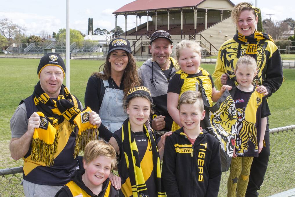 Stawell's Richmond supporters show off their yellow and black. Picture: PETER PICKERING