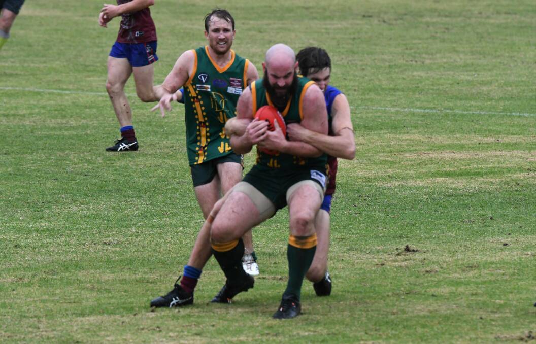 Barber brings down Dimboola's Justin Chilver in a tackle. Picture: MATT CURRILL