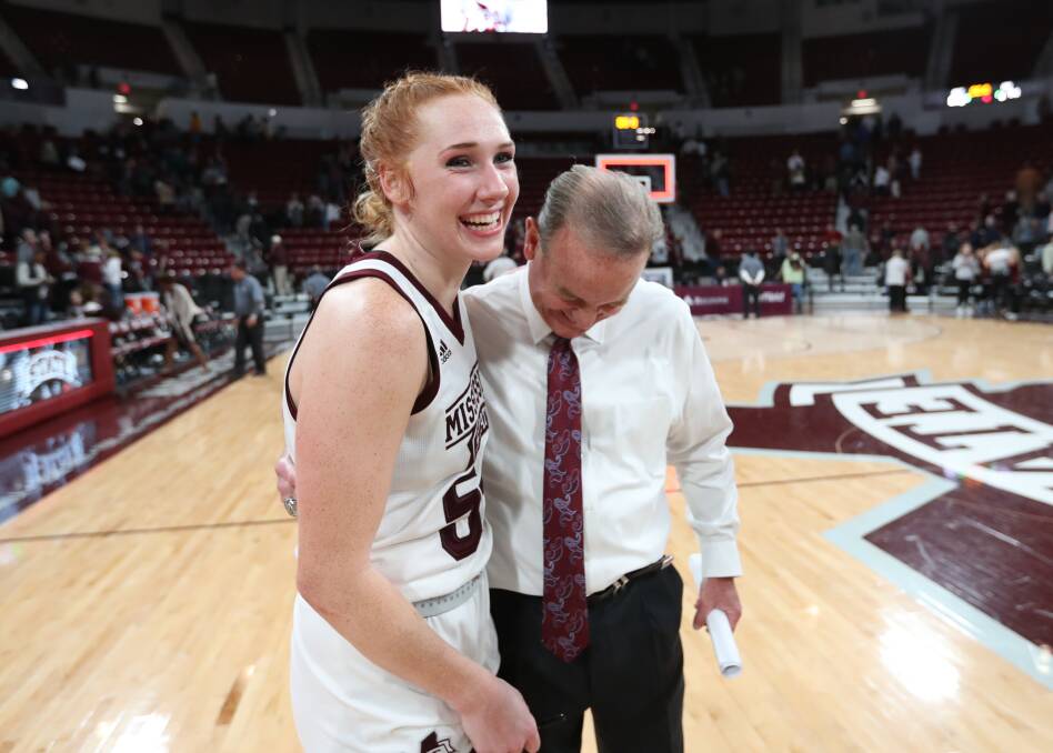 Chloe Bibby with outgoing coach Vic Schaefer. Picture: KELLY DONOHO/MSU ATHLETICS