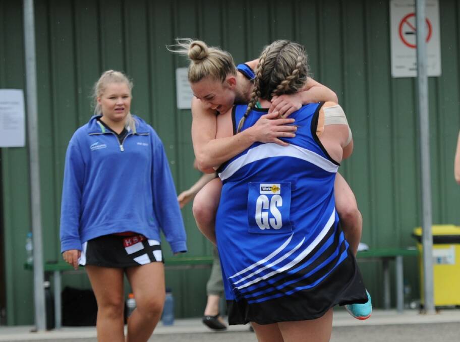 Hayley Campbell and Kirby Knight celebrate after winning the semi-final. Picture: MATT CURRILL