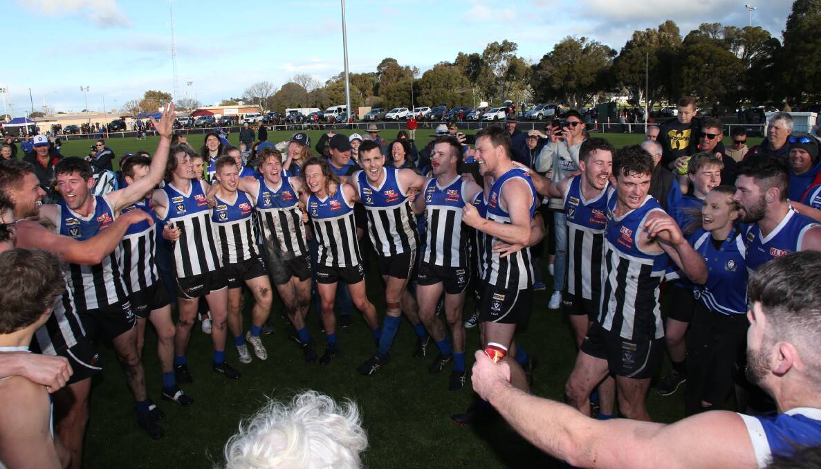 Minyip-Murtoa's footballers sings the song after the final siren. Picture: PETER PICKERING