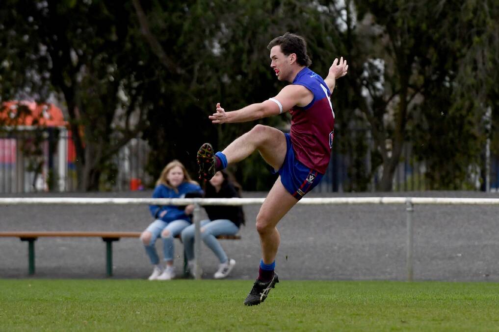 Horsham's Ben Lakin sends the ball up the field. Picture: SAMANTHA CAMARRI