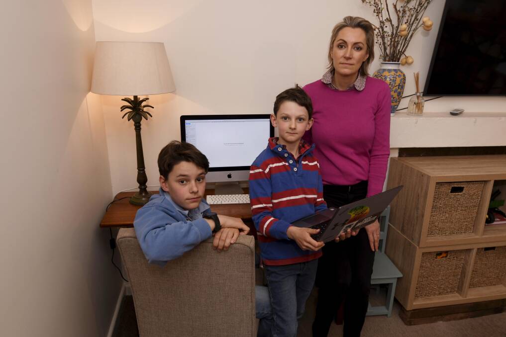 TOUGH TIME: James, 13, George, 8, and mum Megan Read are frustrated that slow internet speeds and unreliable connection are hampering their schoolwork during remote learning. Picture: Lachlan Bence
