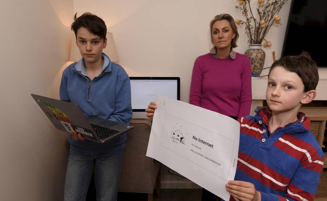 NO CONNECTION: James, 13, George, 8, and mum Megan Read are struggling to complete home schooling because of poor internet connection. Picture: Lachlan Bence