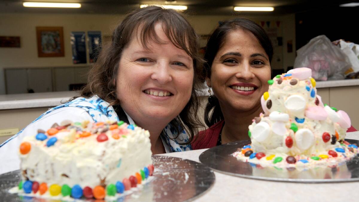 TREAT: Wendy McInnes and Pragya Kant, president of Oasis Wimmera, at a cake-making workshop on Mother's Day. 