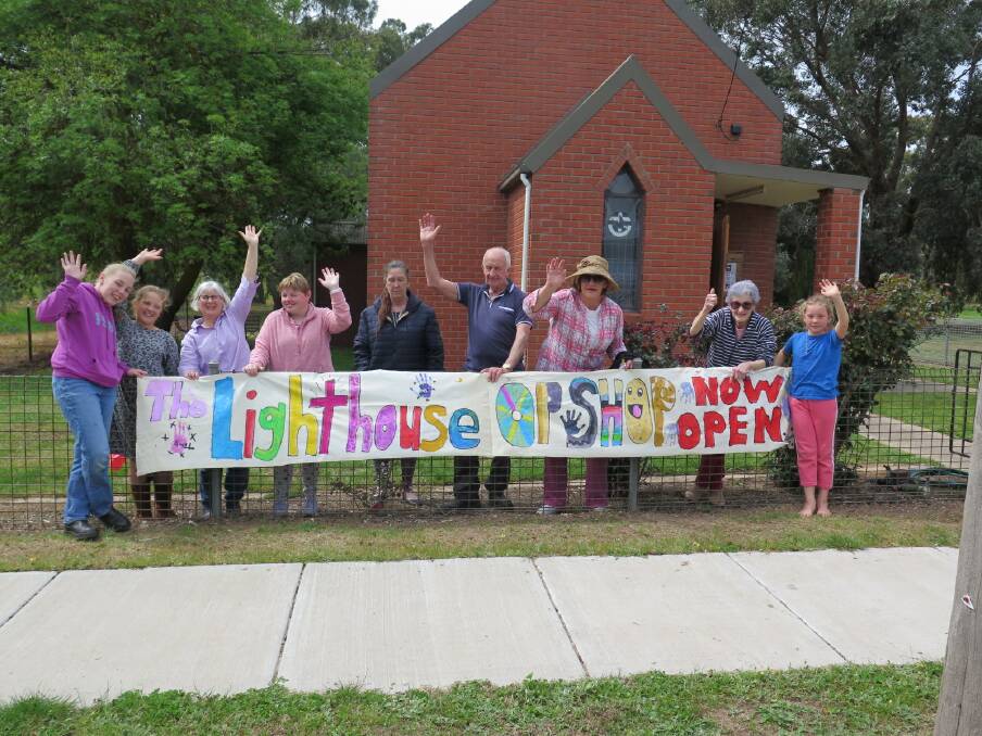 PROJECT: People gather to celebrate the opening of The Lighthouse Opportunity Shop at Landsborough during the school holidays. Picture: CONTRIBUTED