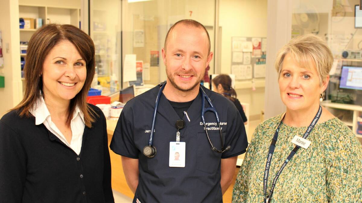 FIRST: Jarrod Hunter (centre) is congratulated by Emergency Department Nurse Unit Manager Odette Richards, left, and Wimmera Health Care Group's director of Clinical Services Maree Woodhouse. Picture: CONTRIBUTED