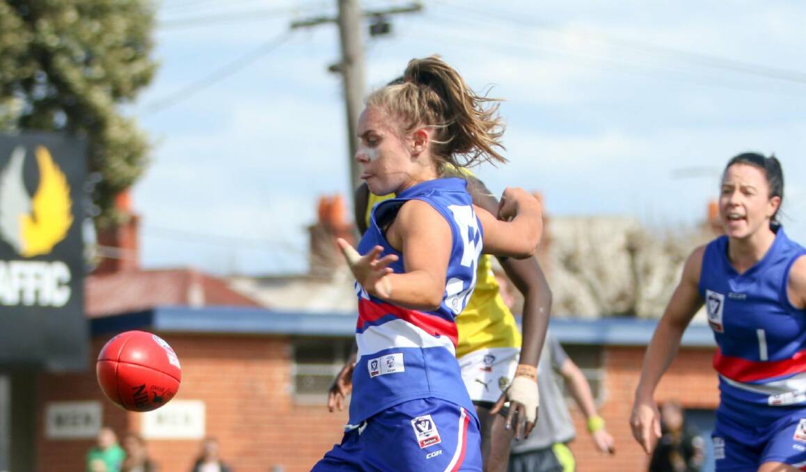 KICK: Ella Wood roosts the ball forward while playing for the Bulldogs earlier in the season. Picture: ELEANOR JEANNE PHOTOGRAPHY