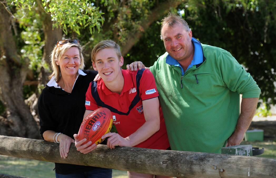 Another highlight of the decade was Edenhope-Apsley's two AFL drafted players, Tom and Oscar McDonald. Pictured: Oscar McDonald with parents Cath and Paul.