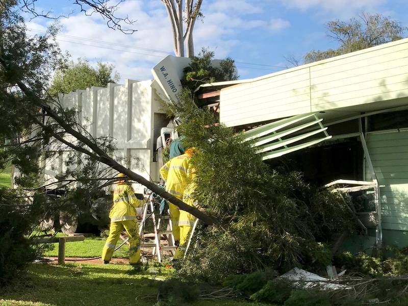 A truck has crashed into a Perth primary school classroom, but none of the 22 students were injured.