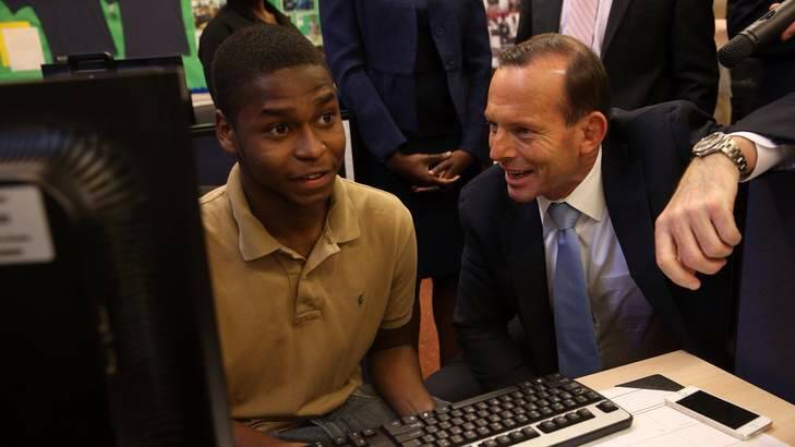 Prime Minister Tony Abbott at the  Pathways in Technology Early College High School in Brooklyn. He is considering bringing the model to Australia. Photo: Andrew Meares